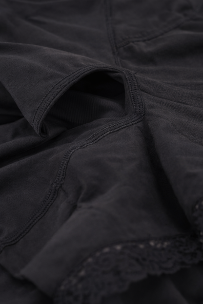 Close-up detail of Zenviiq black faja shapewear showing zipper crotch design, breathable fabric and lace trim for comfort and shaping